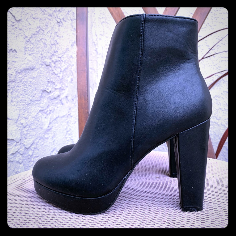 Black platform booties. Size 81/2. Never worn.